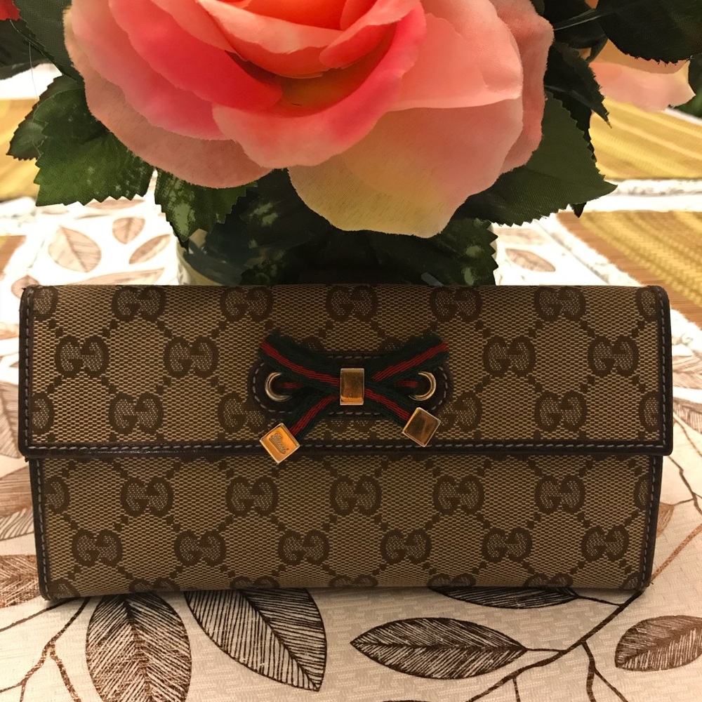 ❌SOLD❌ 💯 Authentic Gucci Web Bow Wallet